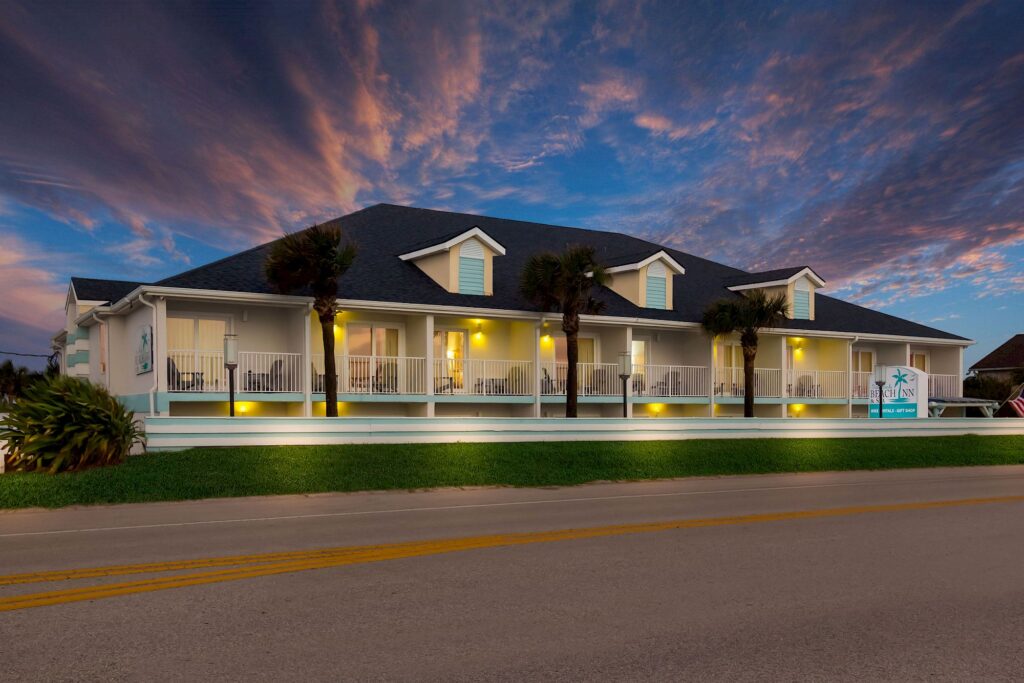 Majestic evening image of the Entrance to the Reception are of the Ocean Sands Beach Boutique Inn