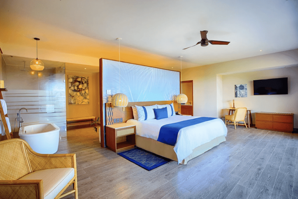 King suite with soaking tub at Armony Marival Resort & Spa