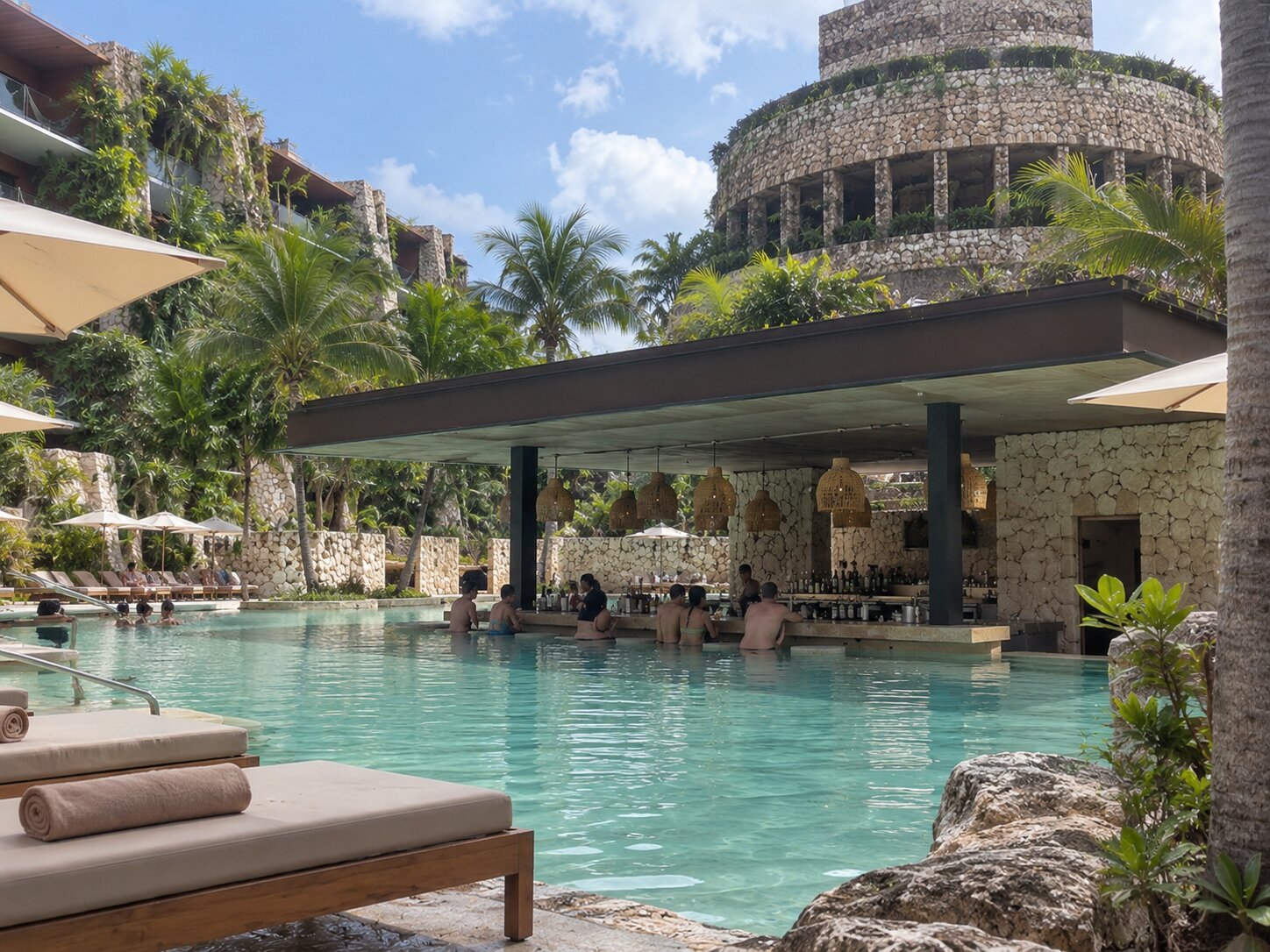 Side view of the pool and lounge area at Casa Xpiral Pool Bar in Hotel Xcaret Mexico
