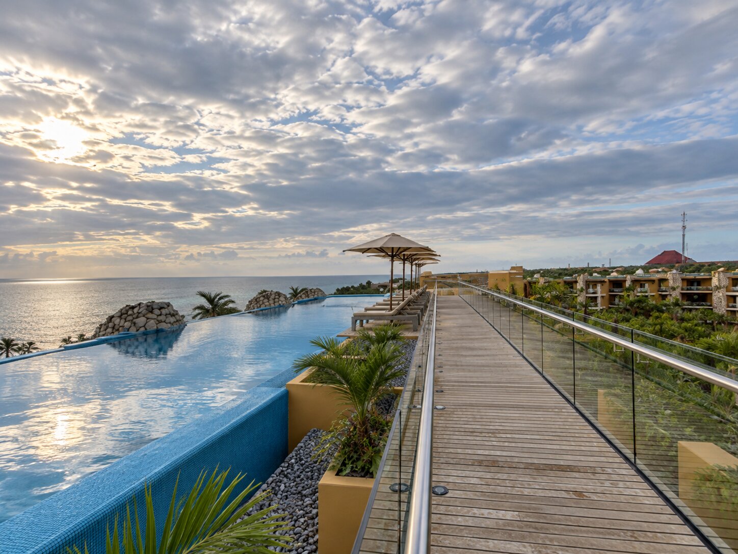 Walkway and pool at Fuego Rooftop Bar in Hotel Xcaret Mexico