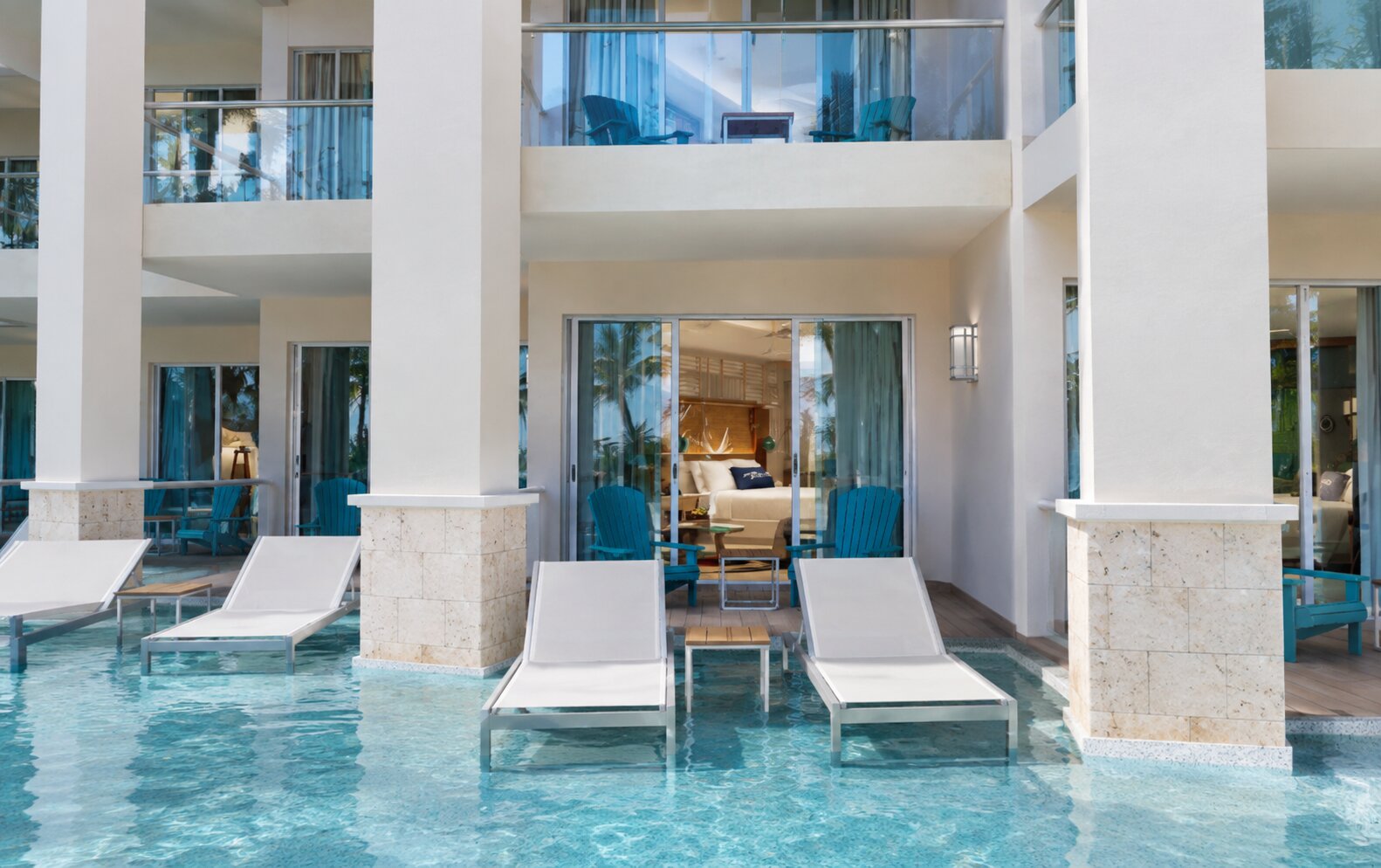 Luxury Paradise Swim-Up Suite exterior and pool access at Margaritaville Island Reserve Riviera Maya