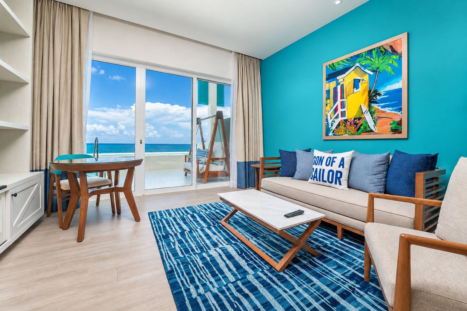 Living room in the Oceanfront Paradise Swim-Up Studio at Margaritaville Island Reserve Riviera Maya