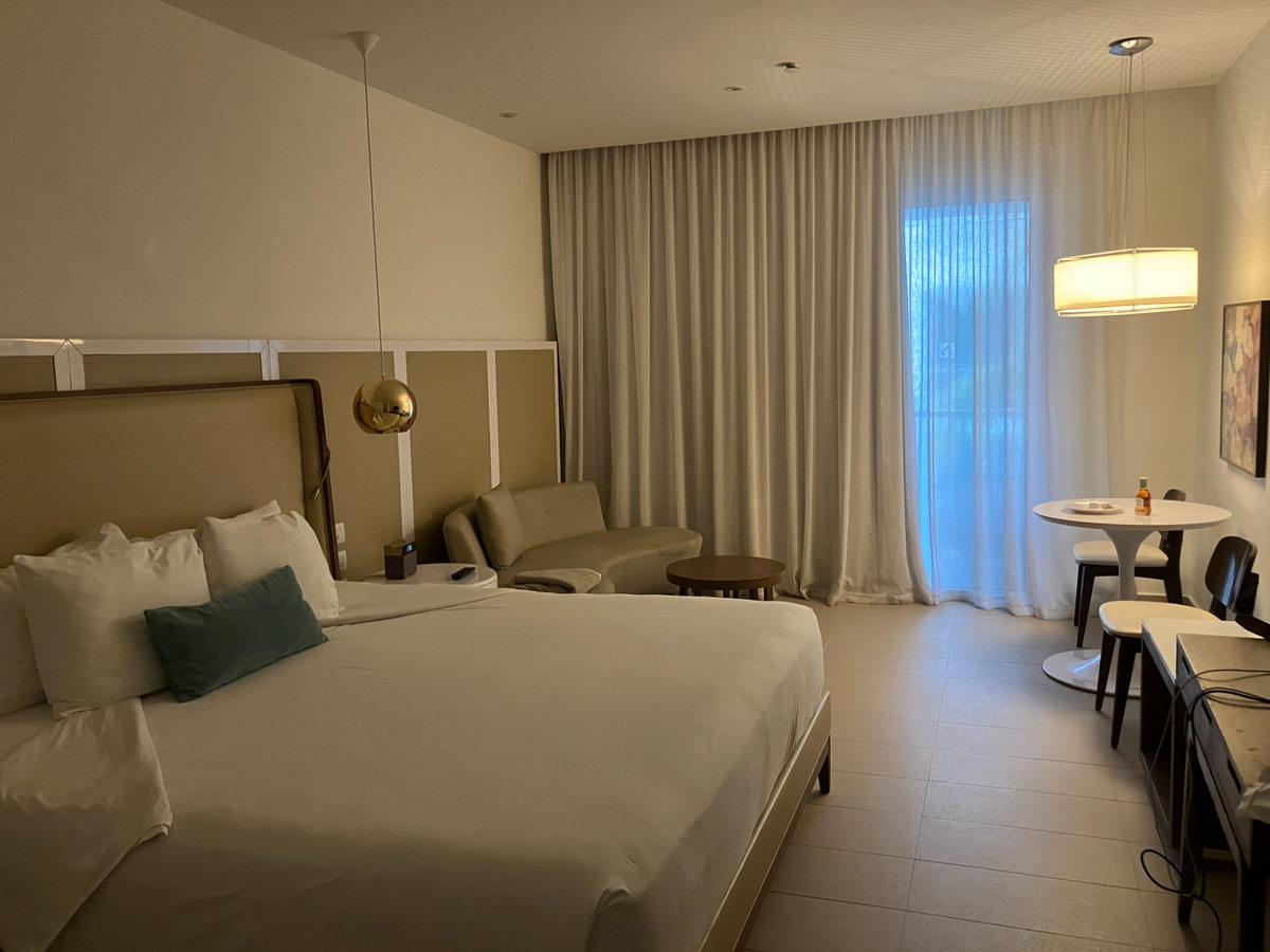 My Premium Suite accommodation at Azul Beach Resort Negril, with bed, sitting area and dining table