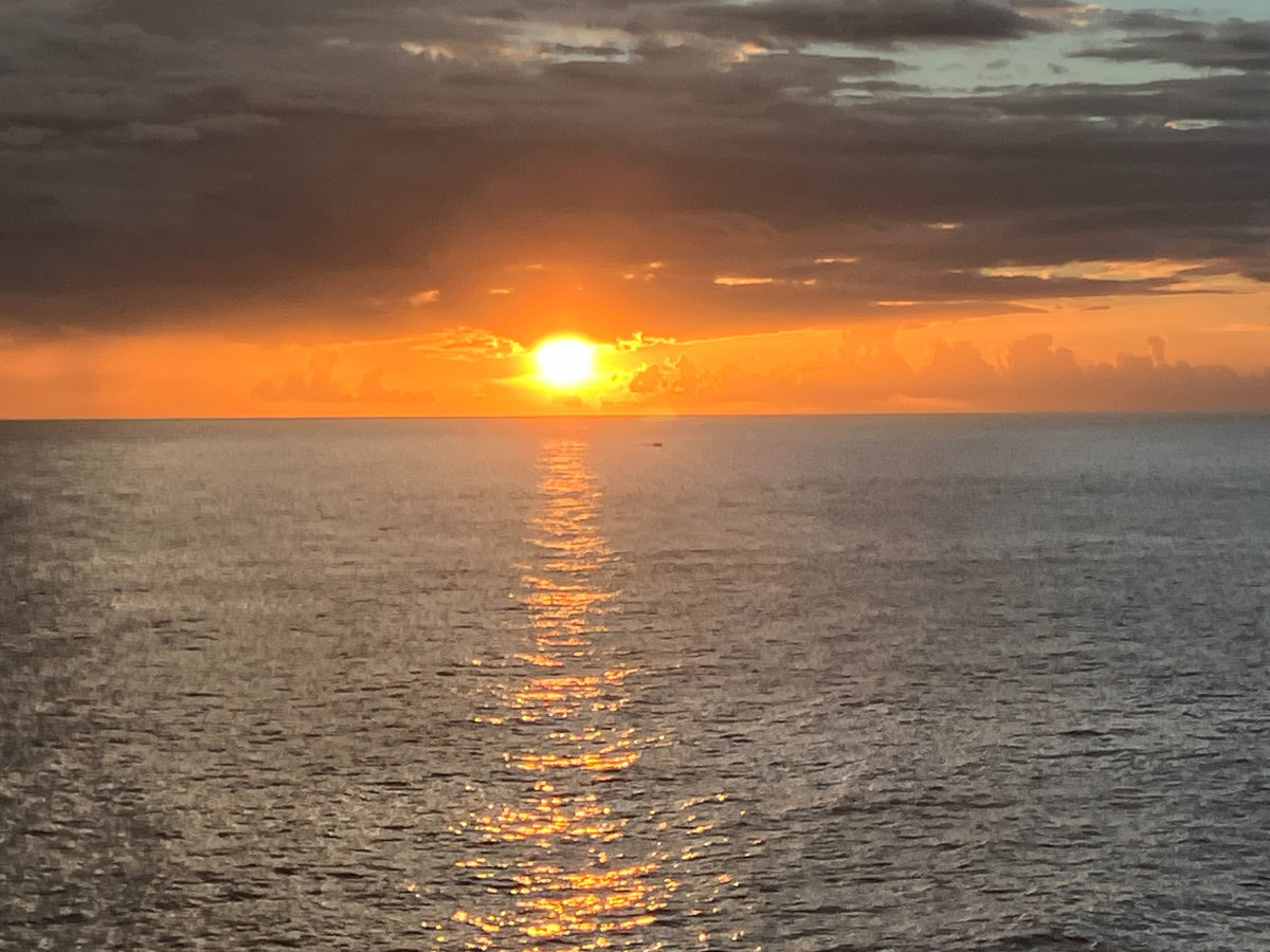 Orange sunset over the Caribbean Sea photographed during my visit to Rick’s Cafe in Negril